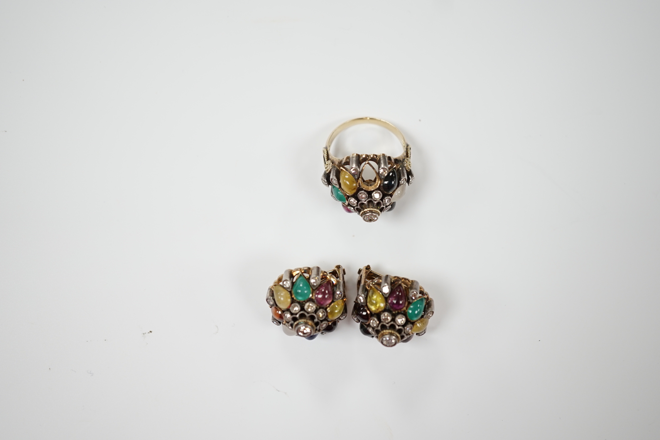 A continental yellow metal, diamond and multi cabochon gem set suite of jewellery, comprising a domed ring, size K(stone missing) and pair of ear clips, 17mm, gross weight 18.7 grams.